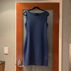 Knit dark blue Saint John dress knee length size 6. Never worn